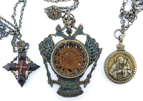 Appraisal: Three necklaces with religious motifs likely Eastern European the first