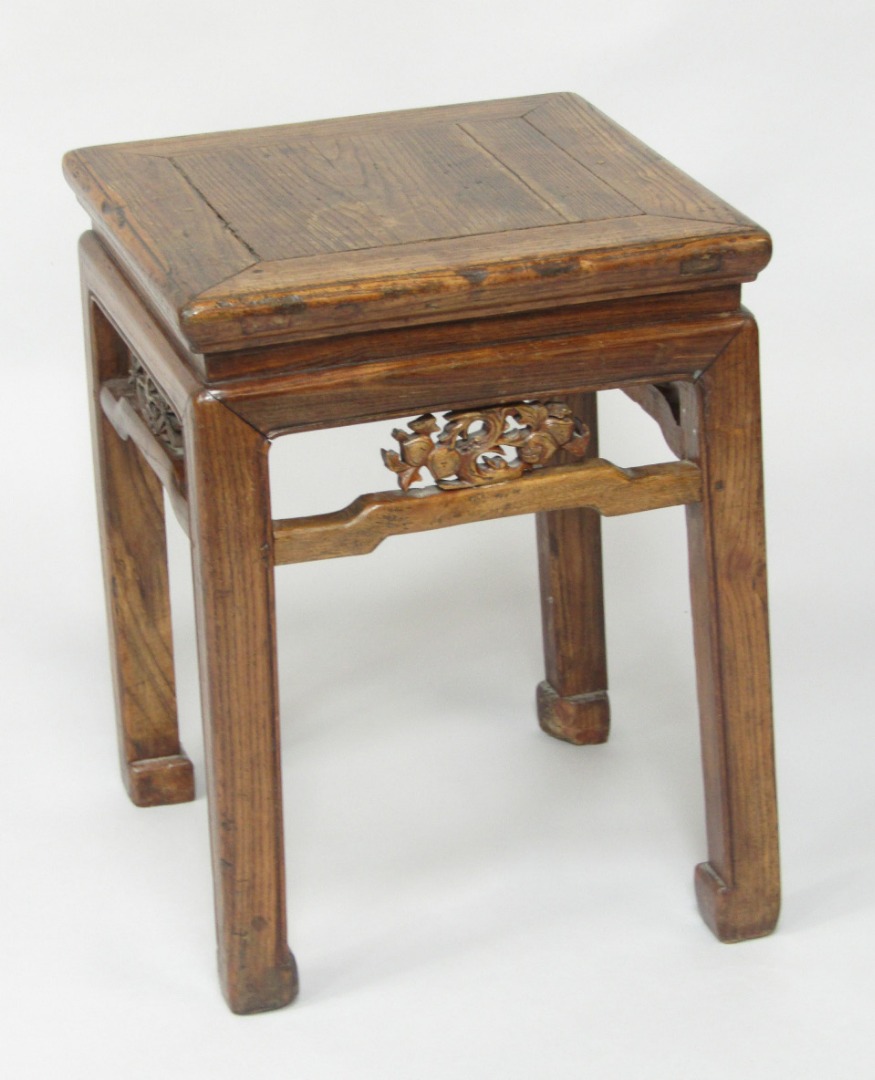 Appraisal: A Chinese hardwood urn stand of square section raised on