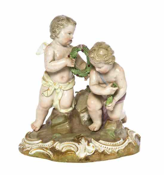 Appraisal: A Meissen Porcelain Figural Group depicting two putti on a