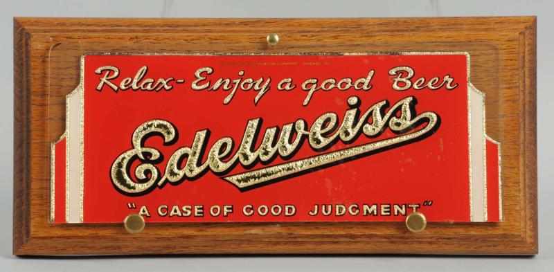 Appraisal: Edelweiss Beer Reverse Glass Sign Mounted on wooden plaque Sign