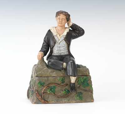 Appraisal: A Full Figural Tobacco Jar of Youthful Boy on Ivied