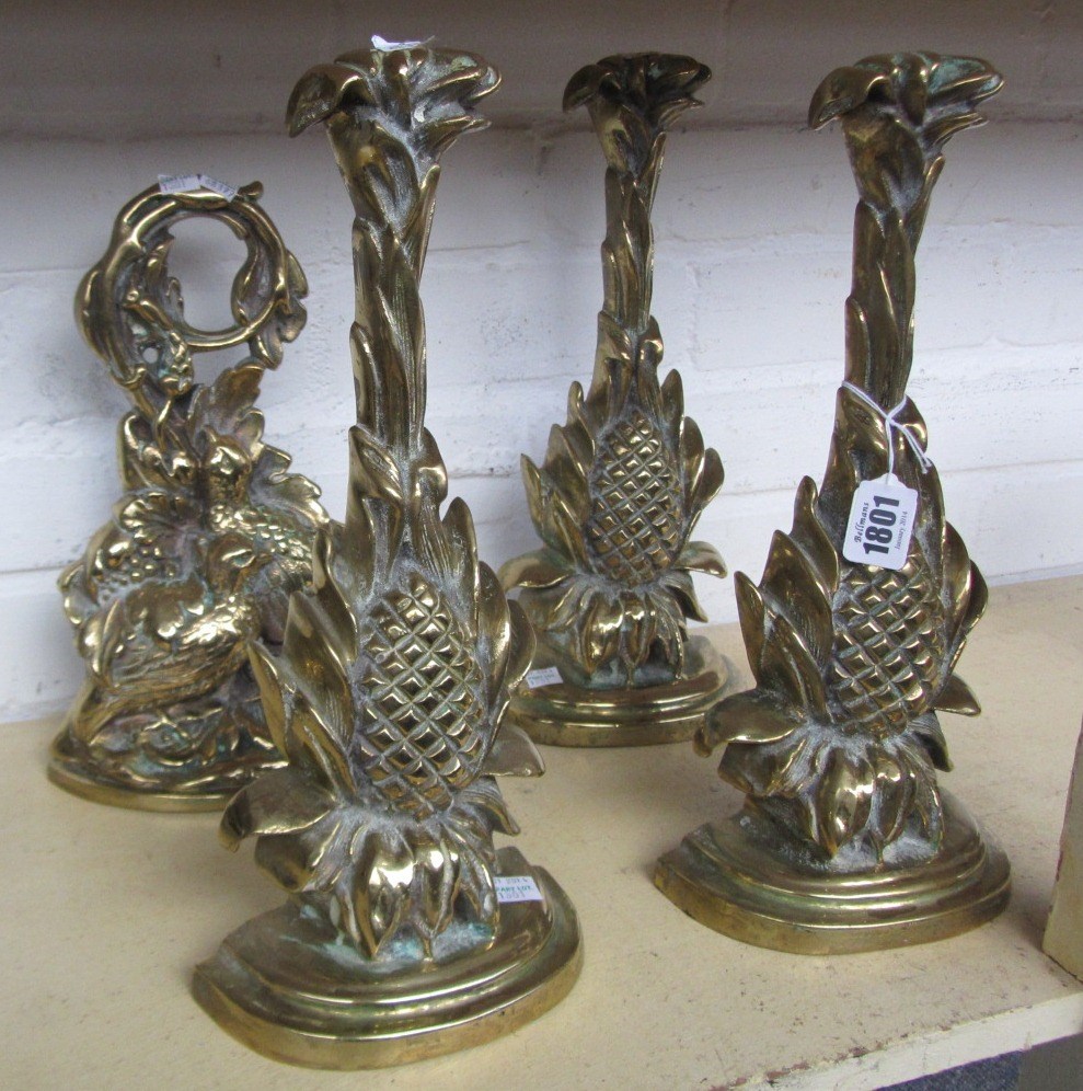 Appraisal: Three Victorian brass doorstops of loaded half block form moulded