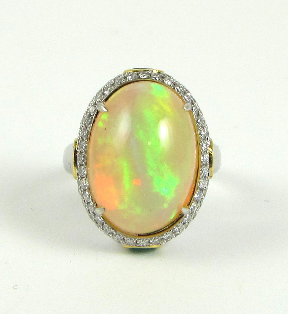 Appraisal: OPAL EMERALD DIAMOND AND FOURTEEN KARAT GOLD RING The k