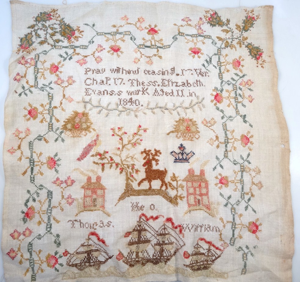 Appraisal: A Victorian motto sampler by Thess Elizabeth Evans age dated