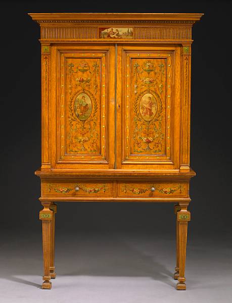 Appraisal: A George III style paint decorated satinwood cabinet on stand