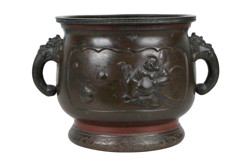 Appraisal: JAPANESE BRONZE TWO-HANDLE PLANTERCondition with varying shades of patina throughout