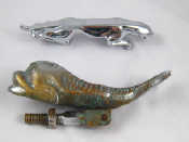 Appraisal: A chromium plated Jaguar car mascot cm long together with