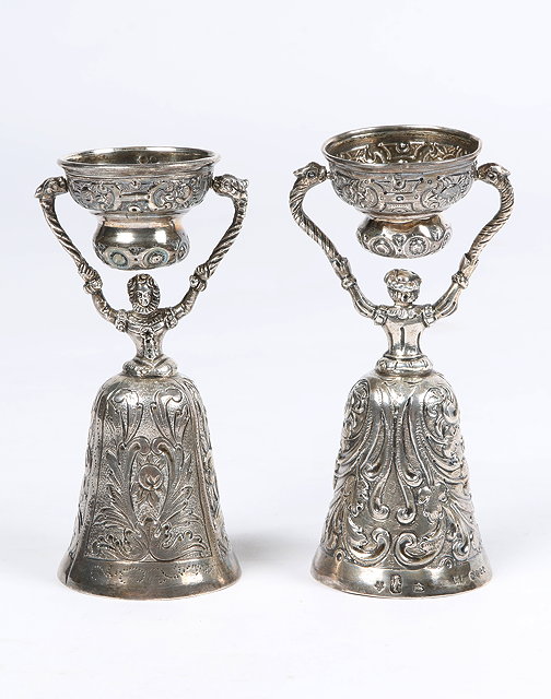 Appraisal: A PAIR OF CONTINENTAL SILVER 'HIS HERS' WAGER CUPS with