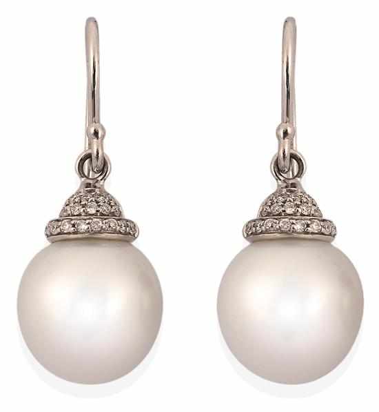 Appraisal: A PAIR OF SOUTH SEA PEARL AND DIAMOND EARRINGS BY