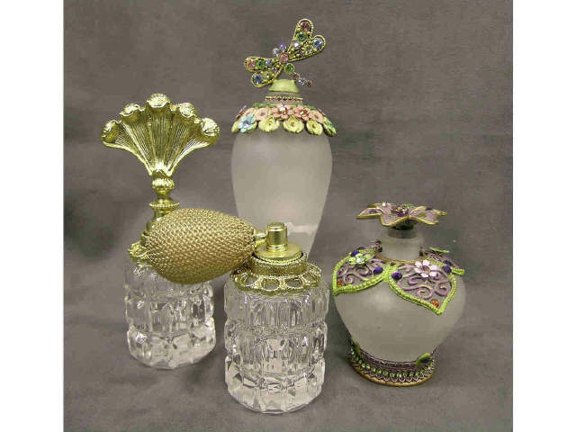 Appraisal: Group of glass perfume bottles two are marked Belladonna Canada