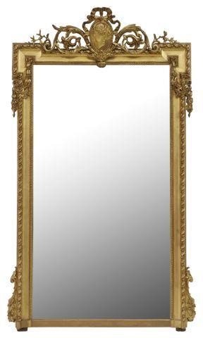 Appraisal: French Neoclassical giltwood mirror th c crest with ribbon bow