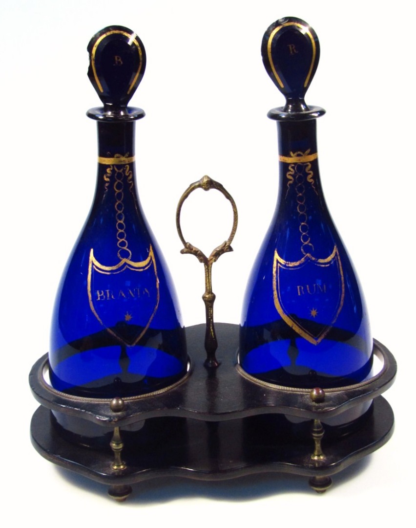 Appraisal: A late thC papier mache decanter set with two Bristol