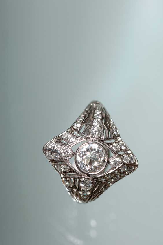 Appraisal: DECO DIAMOND AND PLATINUM RING Ornately openwork Art Deco diamond