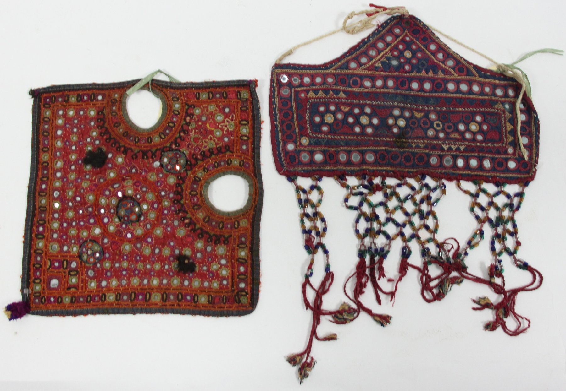 Appraisal: An embroidered and mirrored bullock's head ornament Kathanak cm square