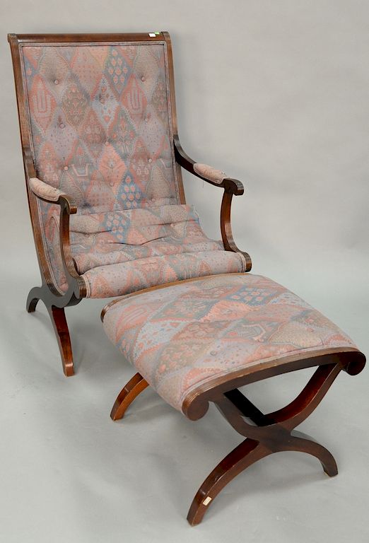 Appraisal: Kindel mahogany upholstered armchair with footstool Kindel mahogany upholstered armchair