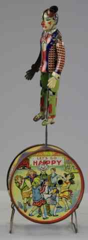 Appraisal: 'HAPPY'' CLOWN ON DRUM TOY Kidd Metal Toys rare example