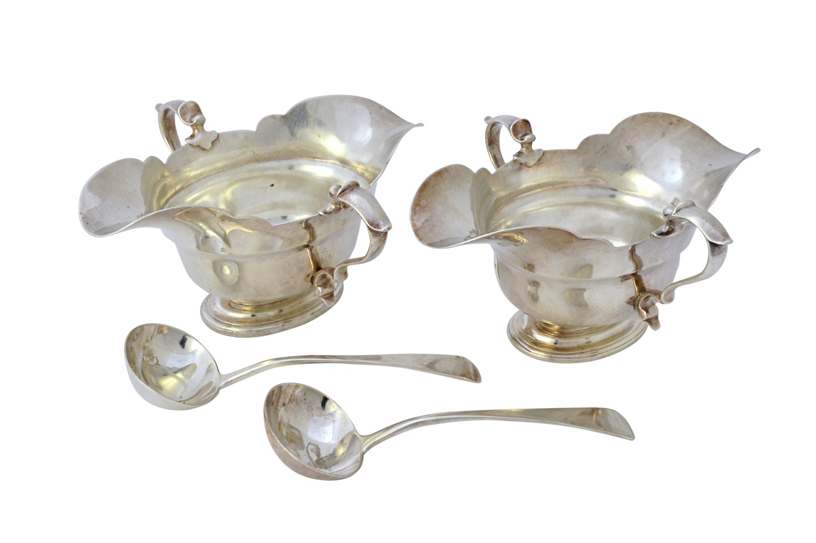 Appraisal: Silver comprising two similar twin handled shaped oval double lipped