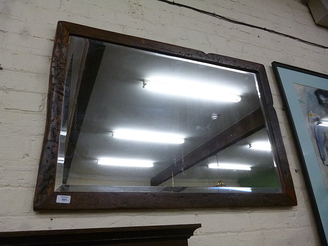 Appraisal: A RECTANGULAR WAXED HARDWOOD MIRROR with bevelled plate approximately cm