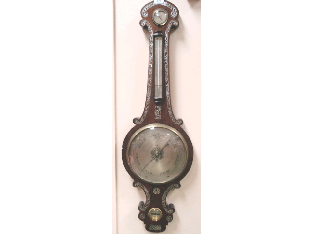 Appraisal: A Victorian rosewood wheel barometer with mother-of-pearl inlays and formed