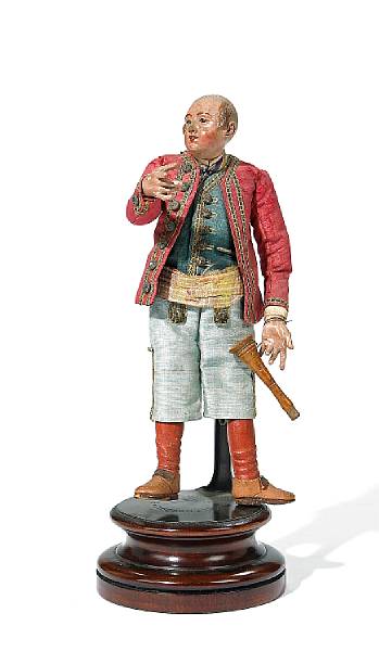 Appraisal: An Italian cr che figure of a musician with trumpet