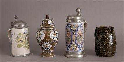 Appraisal: FOUR CONTINENTAL POTTERY ARTICLES Comprising a Dutch caf -au-lait ground