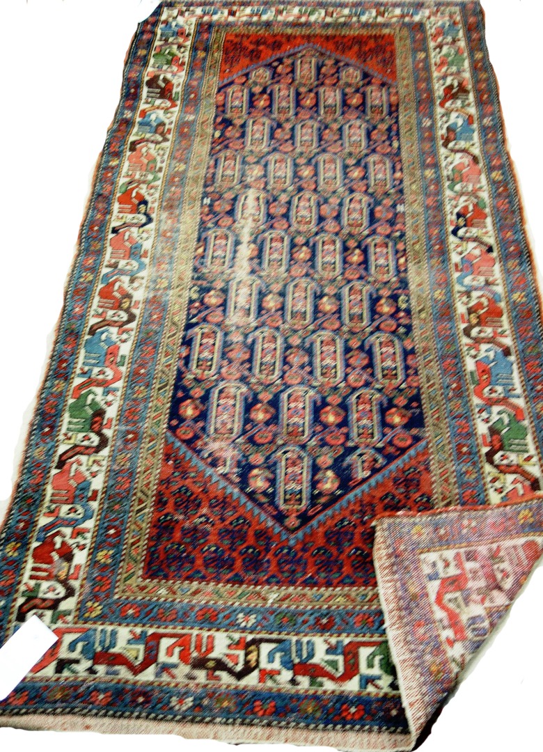 Appraisal: A Fereghan rug of Caucasian design Persian the indigo field