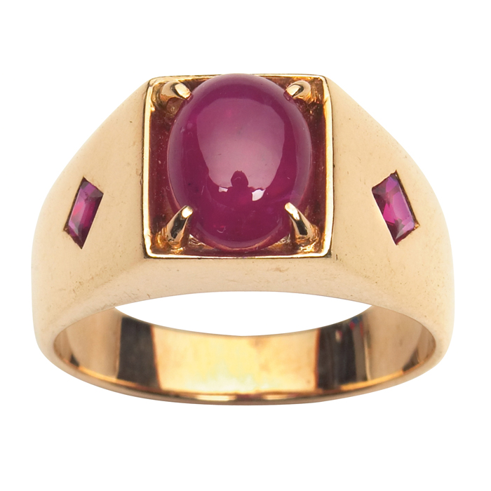 Appraisal: s k gold ring prong-set ruby cabochon with inset diamond-shaped