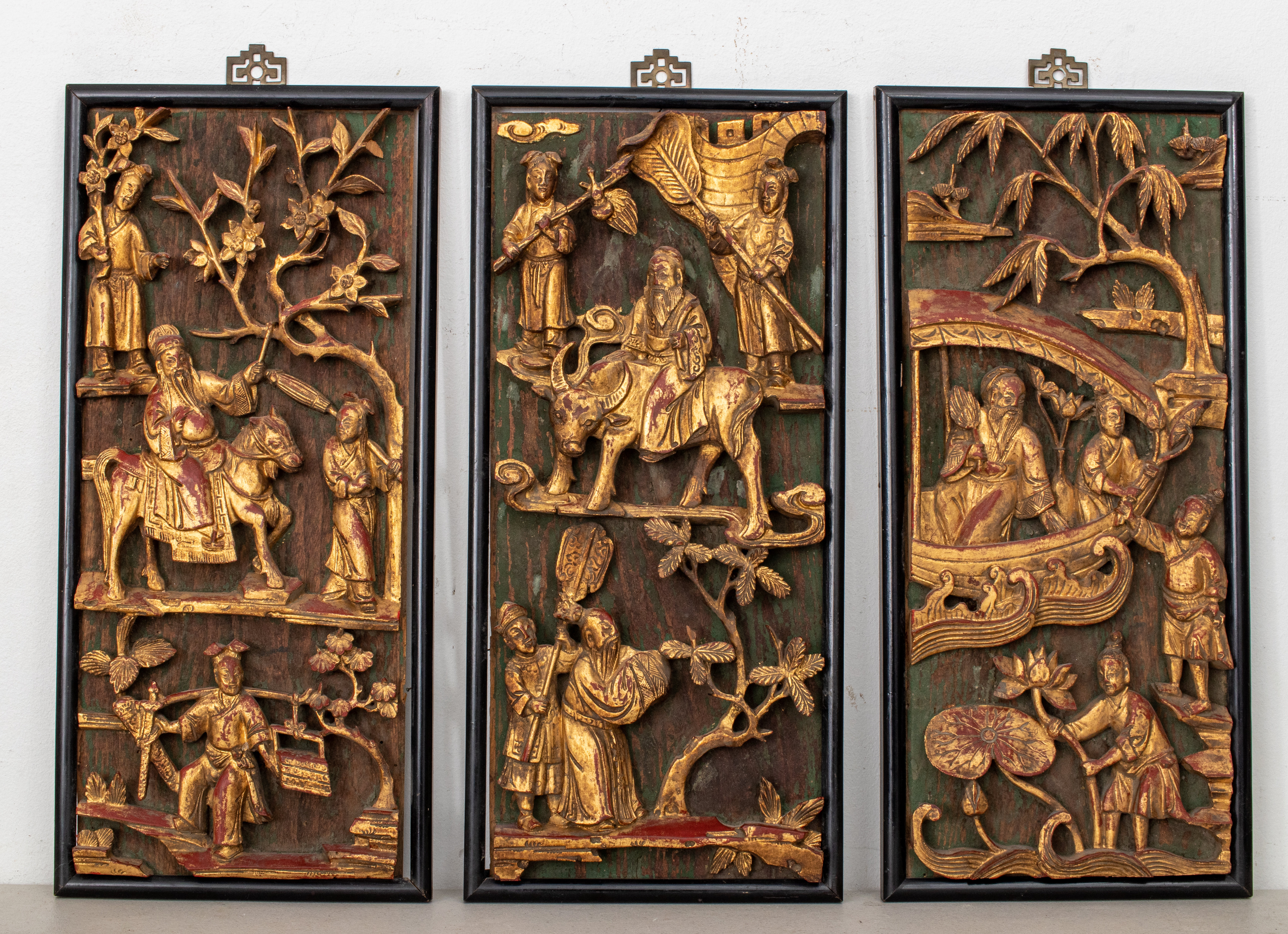 Appraisal: CHINESE GILTWOOD CARVED PLAQUES Three antique Chinese giltwood carvings depicting