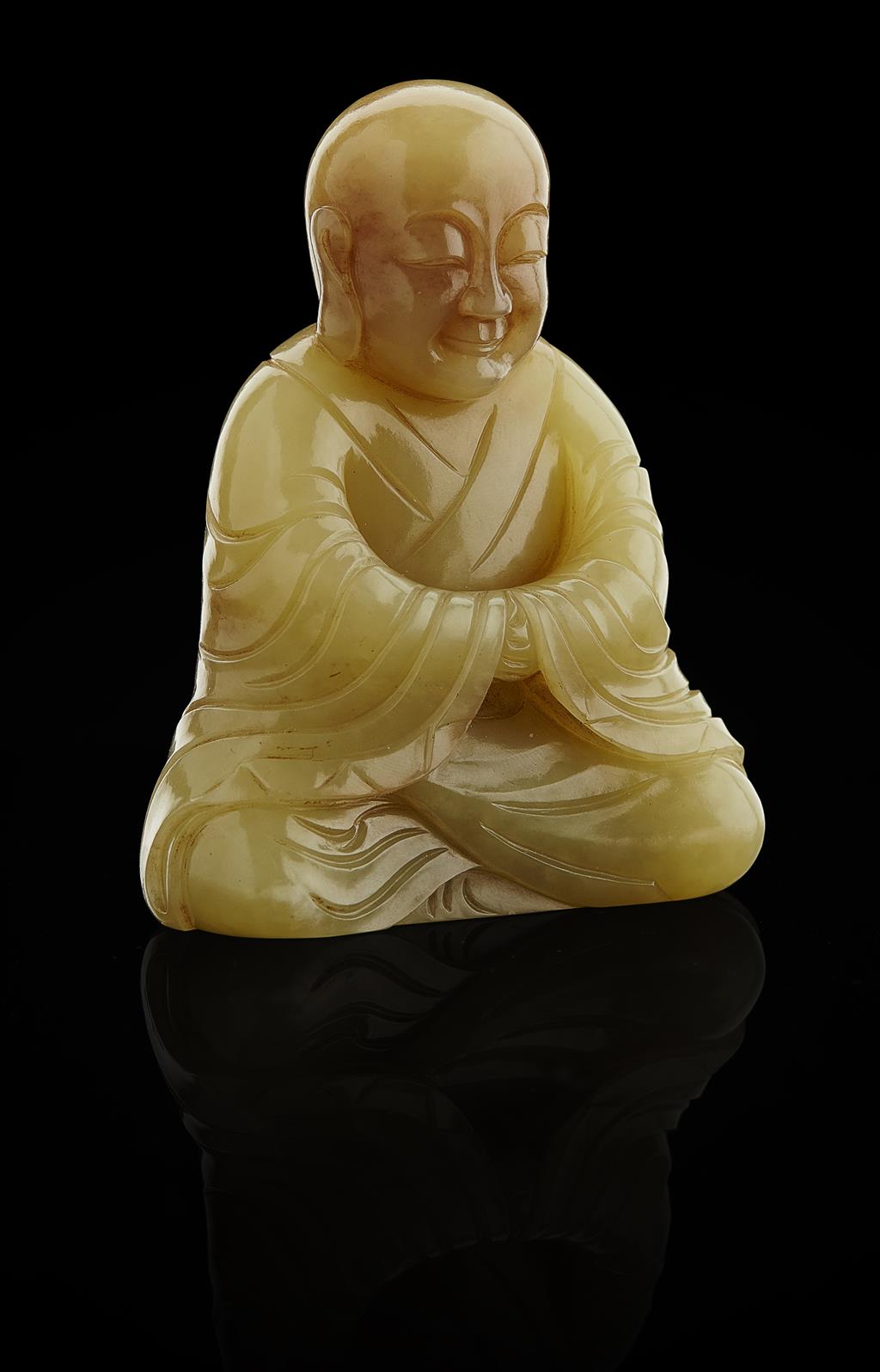 Appraisal: FINE YELLOW-GREEN JADE FIGURE OF SEATED LUOHAN QING DYNASTY delicately