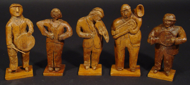 Appraisal: Five piece Irish folk art carved wooden band each cm