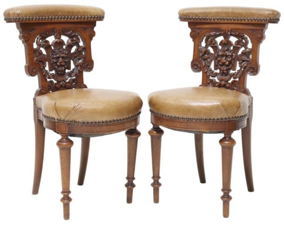 Appraisal: pair English carved mahogany smoking chairs late th c closed