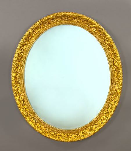 Appraisal: Large Carved Giltwood and Plaster Oval Looking Glass in the