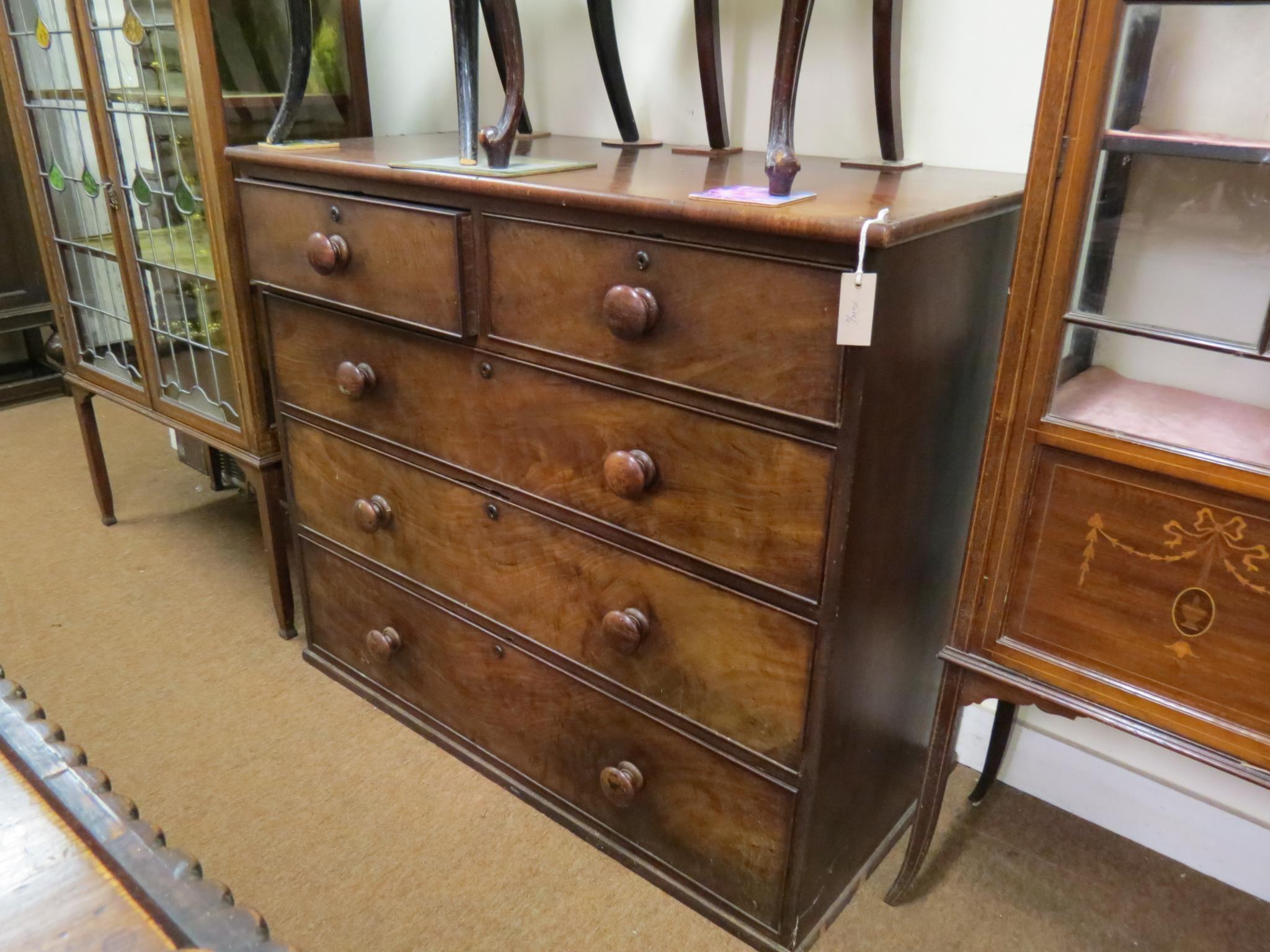 Appraisal: A Victorian mahogany chest two short and three long drawers