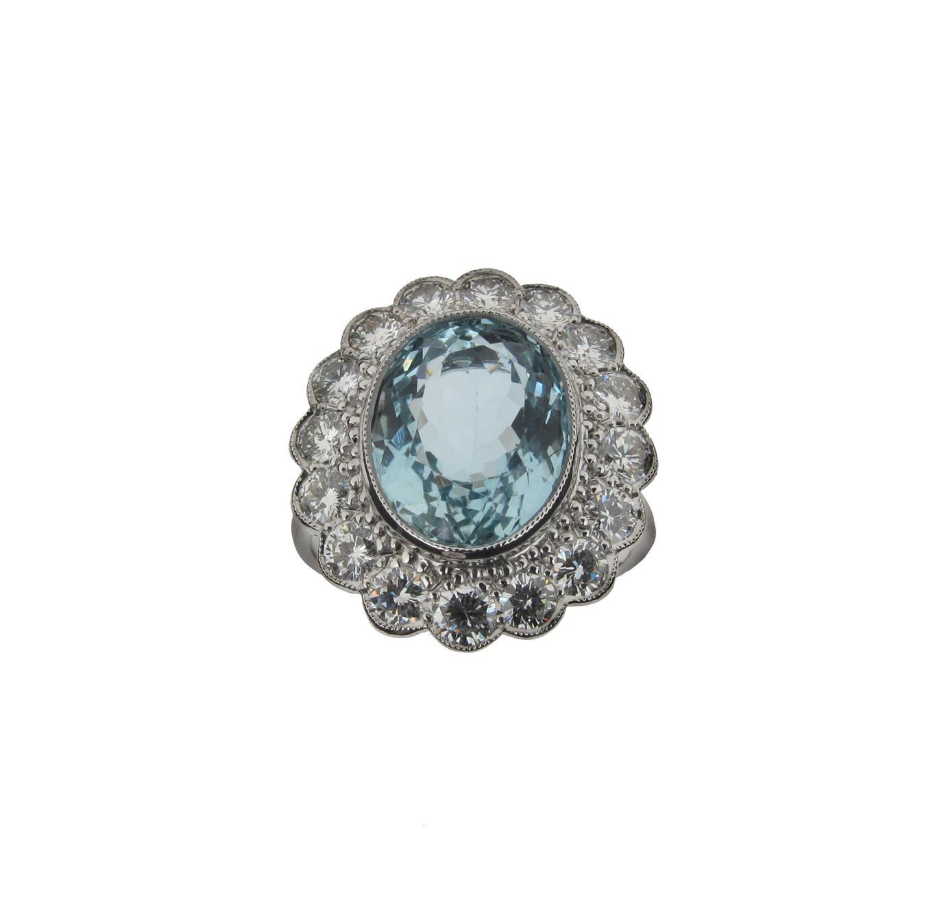 Appraisal: An aquamarine and diamond cluster ring