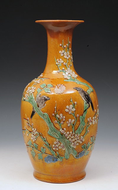 Appraisal: A CHINESE HONEY GLAZED BALUSTER VASE decorated birds and blossom