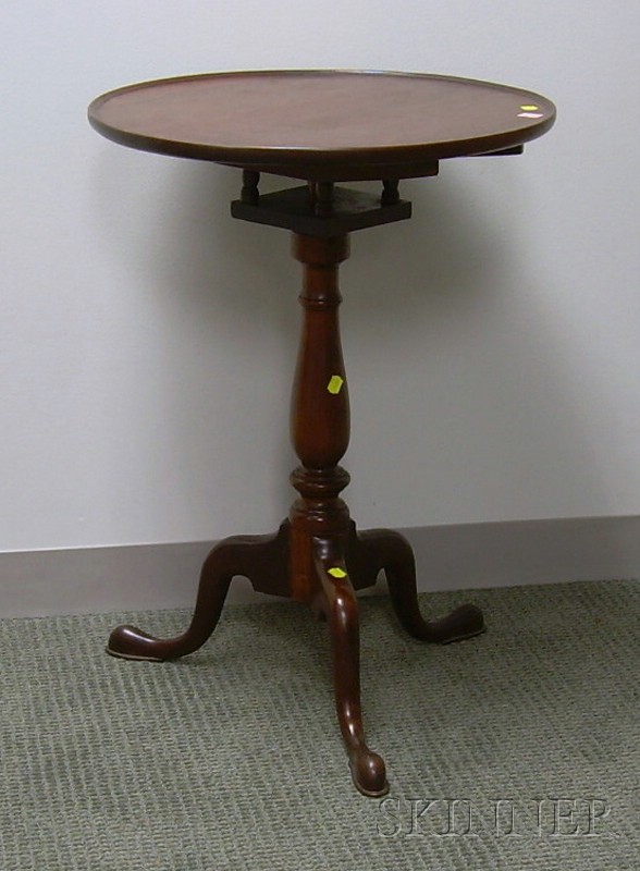 Appraisal: Chippendale-style Walnut Dish Tilt-top Birdcage Candlestand ht dia in