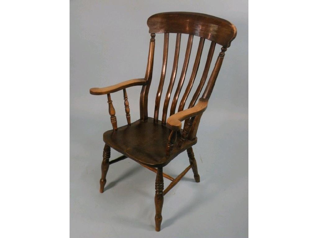 Appraisal: An late thC-early thC lathe back Windsor open armchair with