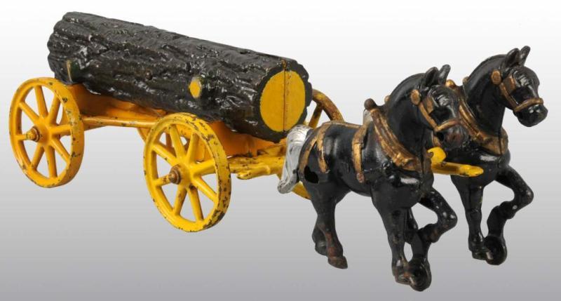 Appraisal: Cast Iron Kenton Two Horse-Drawn Log Wagon Toy Description Pulled