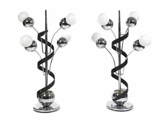 Appraisal: A Pair of Modernist Chrome and Ebonized Wood Four-Light Table