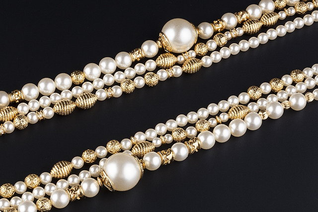 Appraisal: A simulated pearl necklace by Louis F raud comprising three