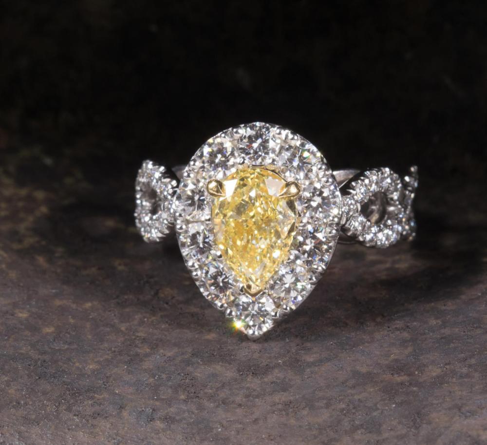 Appraisal: GIA CERTIFIED FANCY YELLOW INTERNALLY FLAWLESS DIAMOND RING The platinum