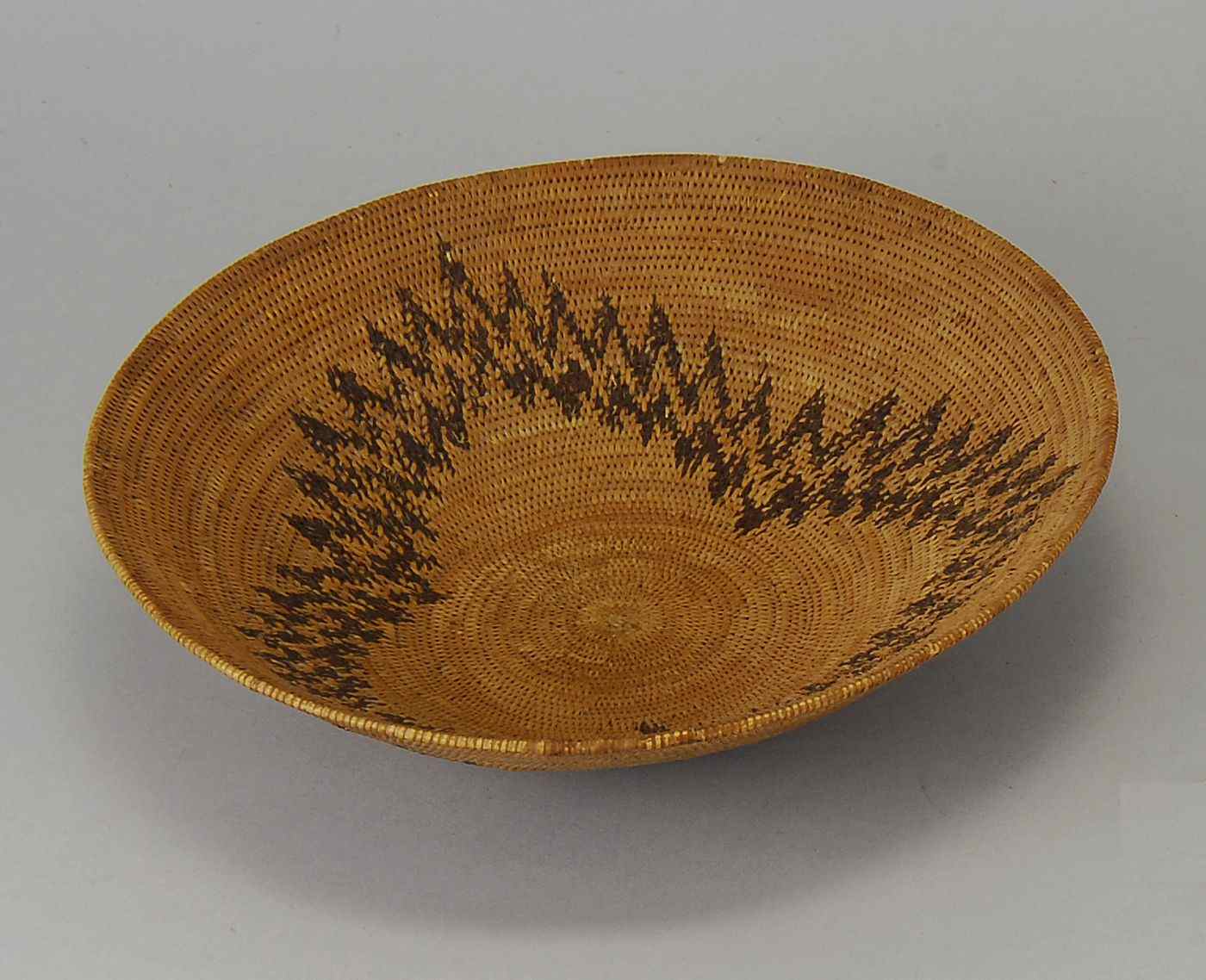 Appraisal: CALIFORNIA INDIANBASKETEarly th CenturyWith stylized mountain design Diameter ''