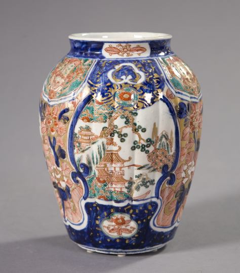 Appraisal: Japanese Meiji Imari Ribbed Porcelain Vase in richly polychromed and