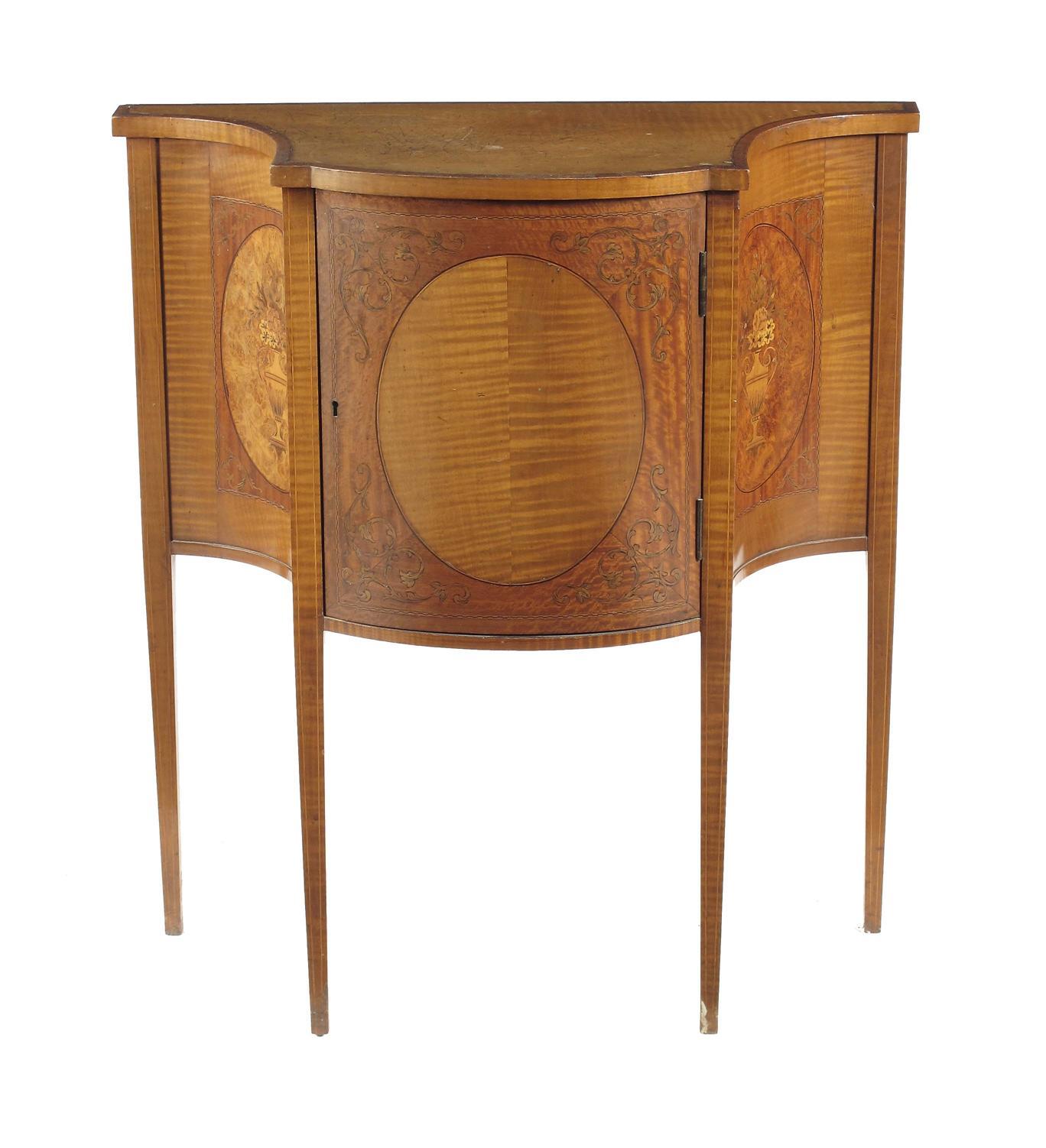 Appraisal: A satinwood and marquetry bowfront commode