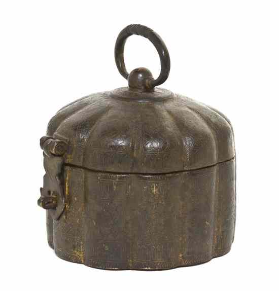 Appraisal: An Indian Bronze Lidded Box having a rubbed handled domed