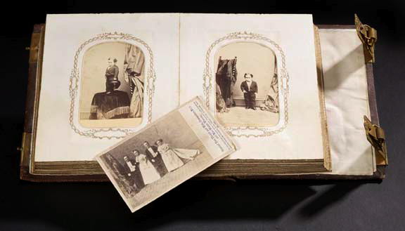 Appraisal: Reconstruction-Era Carte de Visite Album the brown cover with four