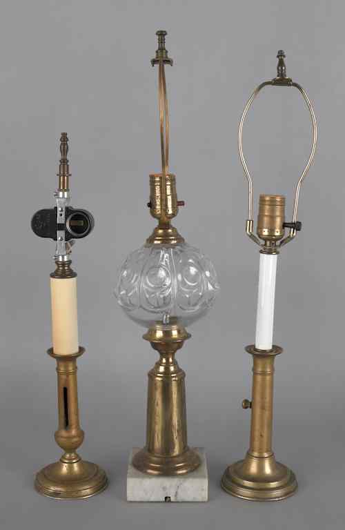 Appraisal: Three brass table lamps