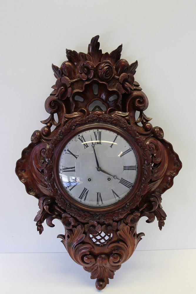 Appraisal: F Broberg Highly Carved Wall Clock From a Pawling NY