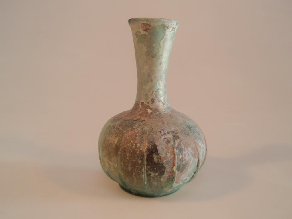 Appraisal: A Roman light bluish-green ribbed glass flask the tall funnel