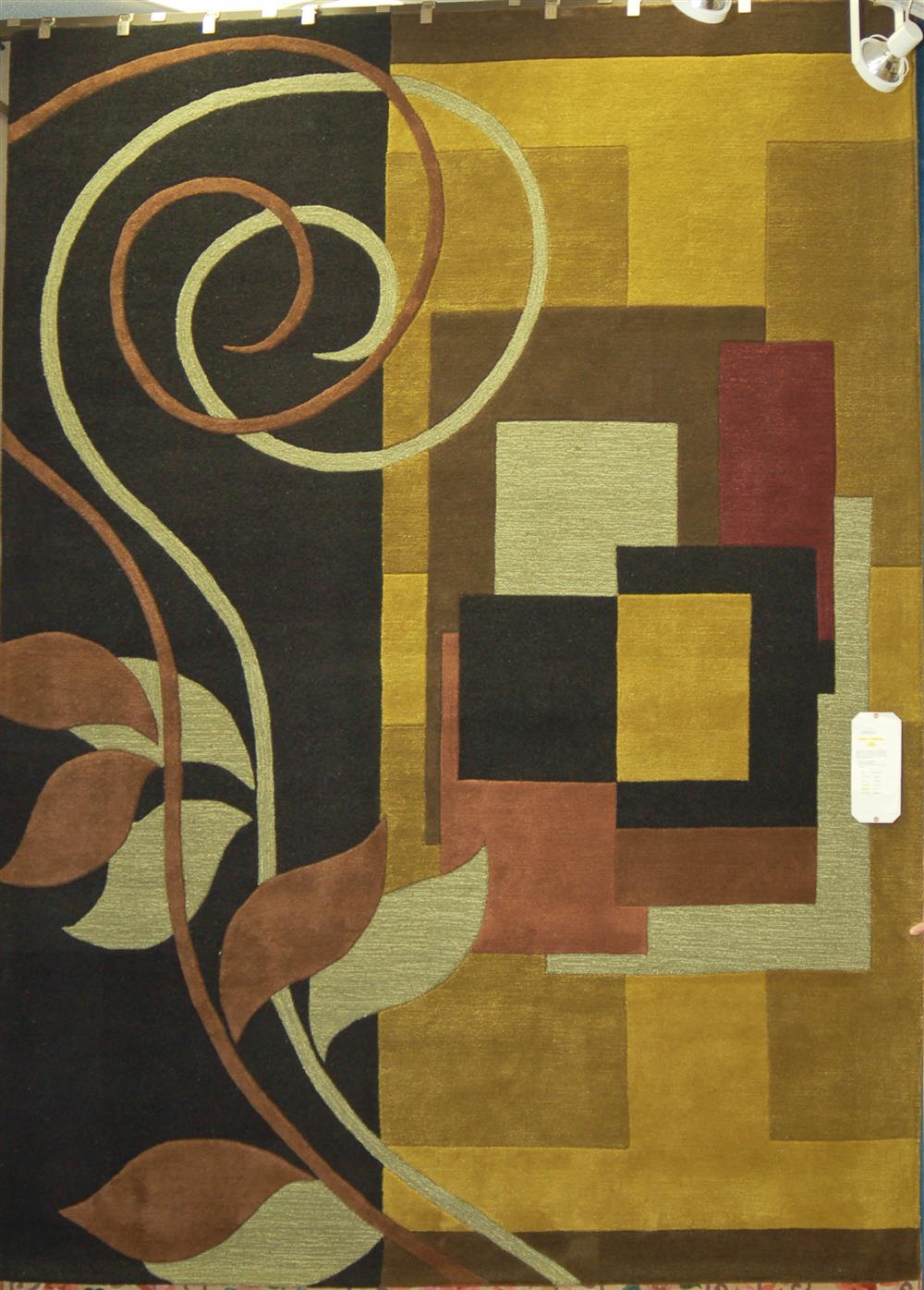 Appraisal: KARASTAN CONTEMPORARY RUG having a geometric design with a leaf